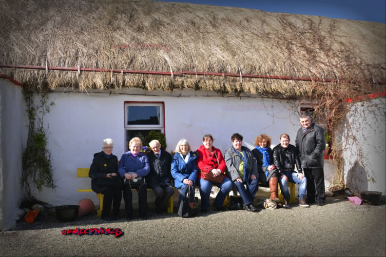 Members of the group enjoying the sun in the Famine Village. Photo by Ephy McConnell
